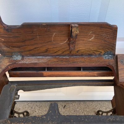 LOT 60: Vintage / Antique Rolling Singer Sewing Machine Cabinet with Wrought Iron Base