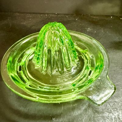 LOT 116: Vintage Uranium Glass Juicer and Measuring Cut. Set