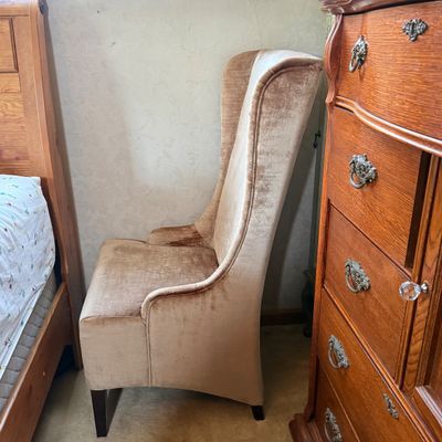 LOT 37: Upholstered High Backed Winged Chair