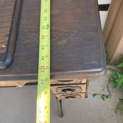 LOT 60: Vintage / Antique Rolling Singer Sewing Machine Cabinet with Wrought Iron Base