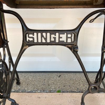 LOT 60: Vintage / Antique Rolling Singer Sewing Machine Cabinet with Wrought Iron Base