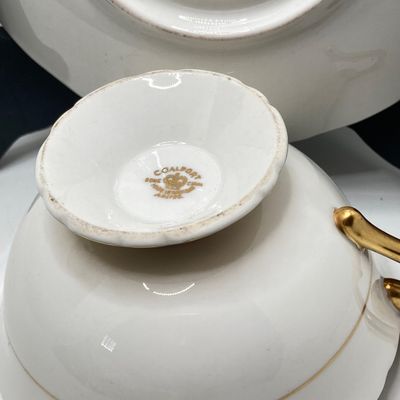 LOT 102: The Peacock Collection - Assorted Peacock Decor (Tracy Porter Serving Plate, Napkin Holder, Coalport Tea Cup / Saucer) and More