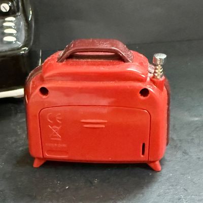 LOT 124: Mr Peanut Cast Iron Bank, ERTL Maytag Ringer Washing Machine Model, Mini Radio, Typewriter Teapot and More