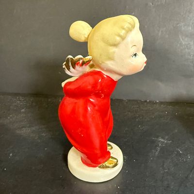 LOT 113: Vintage Kreisler Christmas Shopper with Reindeer and Napco Kissing Angel Shaker