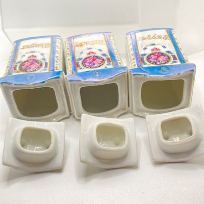 LOT 108: Six Vintage Mepoco Ware Made in Germany Lustreware Canisters / Spice Jars