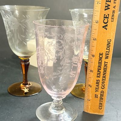 LOT 127: Fostoria Navarre Blue Stemmed Glasses and an Assortment of Other Color Glasses and More