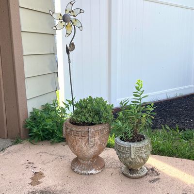 LOT 75: Pair of Greek Key Style Concrete Planters with Plants and Floral Spinner