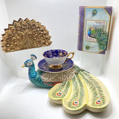 LOT 102: The Peacock Collection - Assorted Peacock Decor (Tracy Porter Serving Plate, Napkin Holder, Coalport Tea Cup / Saucer) and More