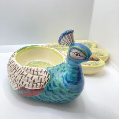 LOT 102: The Peacock Collection - Assorted Peacock Decor (Tracy Porter Serving Plate, Napkin Holder, Coalport Tea Cup / Saucer) and More