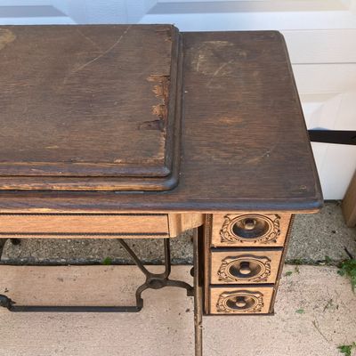 LOT 60: Vintage / Antique Rolling Singer Sewing Machine Cabinet with Wrought Iron Base