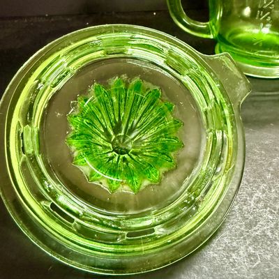 LOT 116: Vintage Uranium Glass Juicer and Measuring Cut. Set