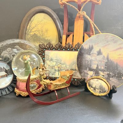 LOT 129: Victorian Christmas Sleigh Ride Decor Including Miniature Wood Sled, Pictures, Plates, Snow-globe and More