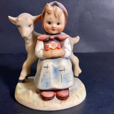 LOT 109: Set of 3 Goebel Hummel Figures - Pray Before Battle, Angel with Lantern, and Good Friends Girl with Lamb