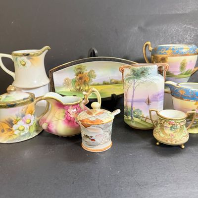 LOT 125: Collection of Painted Nippon Porcelain- Creamers, Pitcher, Plates and More