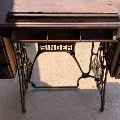 LOT 60: Vintage / Antique Rolling Singer Sewing Machine Cabinet with Wrought Iron Base