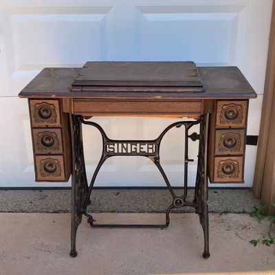 LOT 60: Vintage / Antique Rolling Singer Sewing Machine Cabinet with Wrought Iron Base