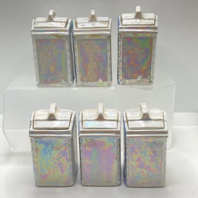 LOT 108: Six Vintage Mepoco Ware Made in Germany Lustreware Canisters / Spice Jars