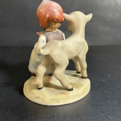LOT 109: Set of 3 Goebel Hummel Figures - Pray Before Battle, Angel with Lantern, and Good Friends Girl with Lamb