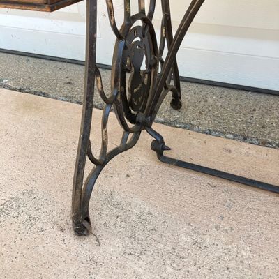 LOT 60: Vintage / Antique Rolling Singer Sewing Machine Cabinet with Wrought Iron Base