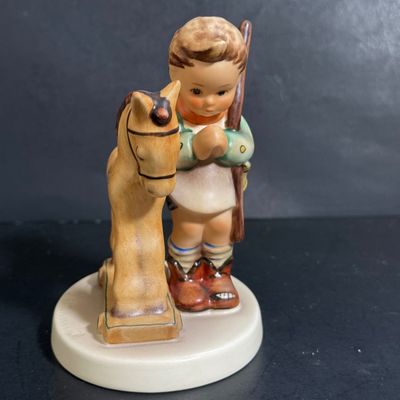 LOT 109: Set of 3 Goebel Hummel Figures - Pray Before Battle, Angel with Lantern, and Good Friends Girl with Lamb