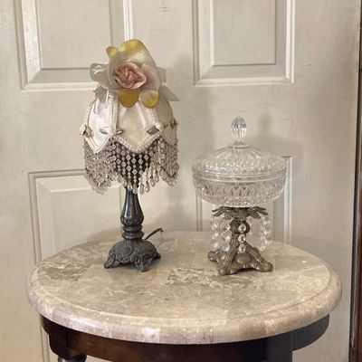 LOT 66: Wood Accent Table with Faux Marble Top, Cut Glass Pedestal Lidded Candy Dish and Decorative Lamp