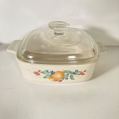 LOT 174: Kitchenware and Bakeware Collection - Corning Ware, Lailani Genuine Monkey Pod Olive Dish, Tea Kettle, Made in Poland Ceramic...