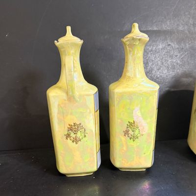 LOT 190: Vintage Czechoslovakian Lusterware Canister, Spice Jars and Decanters