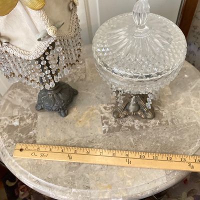 LOT 66: Wood Accent Table with Faux Marble Top, Cut Glass Pedestal Lidded Candy Dish and Decorative Lamp