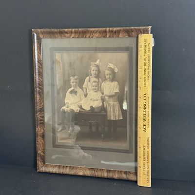 LOT 111: Collection of Framed Photographs of Victorian Children and Victorian Style Doll
