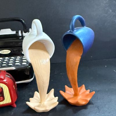 LOT 124: Mr Peanut Cast Iron Bank, ERTL Maytag Ringer Washing Machine Model, Mini Radio, Typewriter Teapot and More