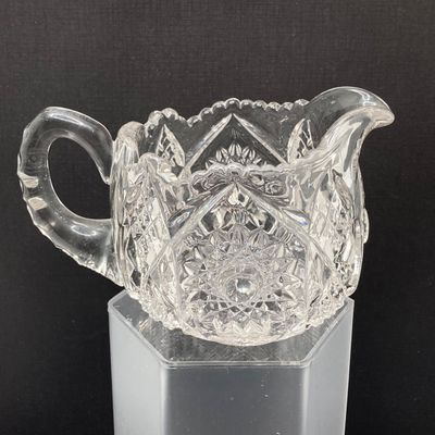 LOT 105: Crystal / Cut Glass - Ruby / Clear Vase, Salt Cellars, Creamer / Sugar Bowls and Large Pitcher