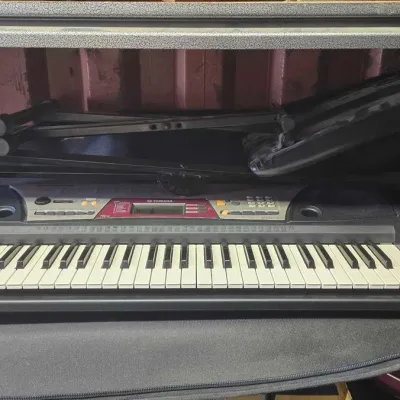 6044 yamaha piano with seat and stand
