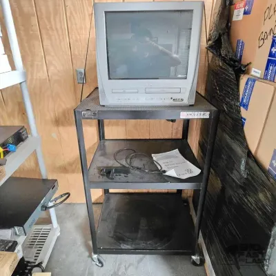 2548 magavox tv and wheeled rack