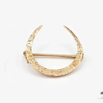 809 10kt gold broach 1 1g