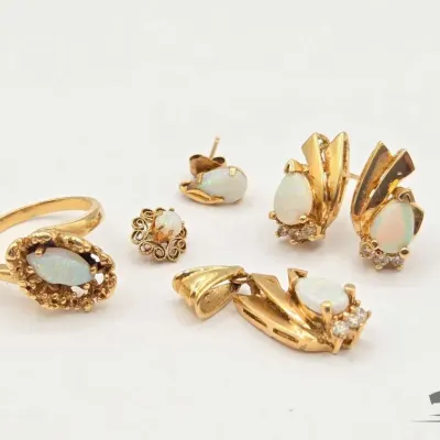 702 14kt gold jewelry with diamonds and opal 9 2g