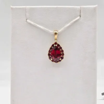 807 10kt gold pendant with semi precious stones 2 1g