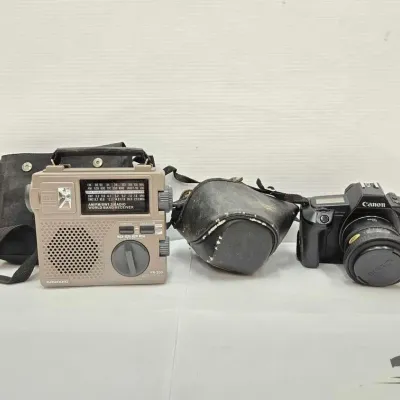 1903 cannon eos 650 digital camera and radio receiver