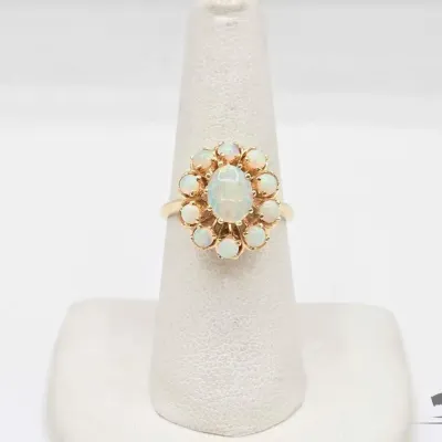 715 14kt gold ring with opals 5 0g