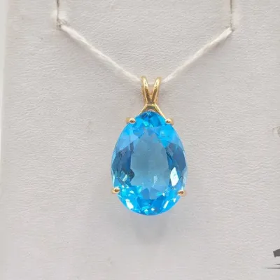 706 14kt gold pendant with topaz 5 7g