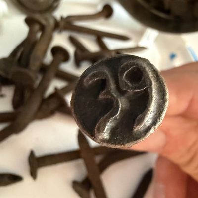 Sale Photo Thumbnail #325: The number on the top of the nail is the year the nail was used on building the railroads.1920-1950