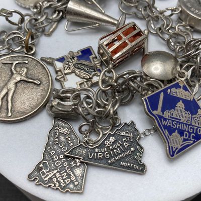 LOT 235: Vintage Elco Sterling Silver Charm Bracelet with Safety Chain and Charms - 54.3gtw