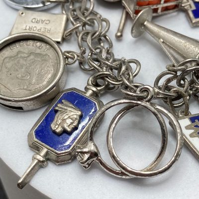 LOT 235: Vintage Elco Sterling Silver Charm Bracelet with Safety Chain and Charms - 54.3gtw