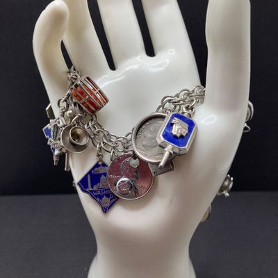 LOT 235: Vintage Elco Sterling Silver Charm Bracelet with Safety Chain and Charms - 54.3gtw