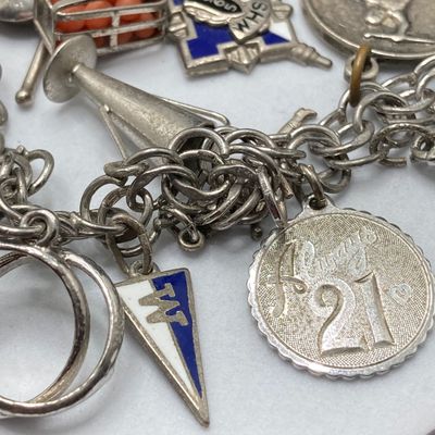 LOT 235: Vintage Elco Sterling Silver Charm Bracelet with Safety Chain and Charms - 54.3gtw