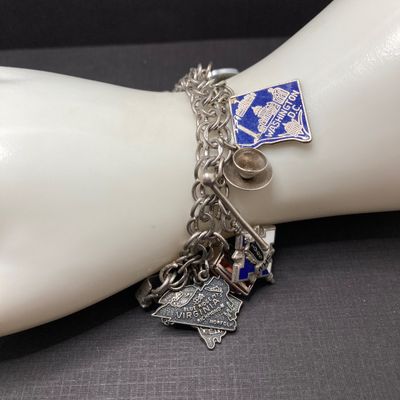 LOT 235: Vintage Elco Sterling Silver Charm Bracelet with Safety Chain and Charms - 54.3gtw