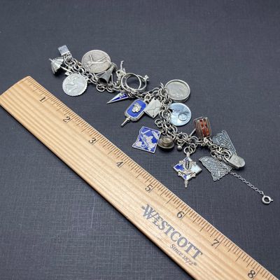 LOT 235: Vintage Elco Sterling Silver Charm Bracelet with Safety Chain and Charms - 54.3gtw