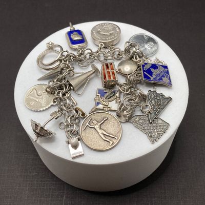 LOT 235: Vintage Elco Sterling Silver Charm Bracelet with Safety Chain and Charms - 54.3gtw
