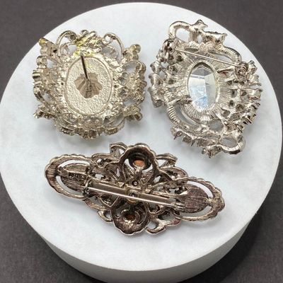 LOT 243: Three Rhinestone / Stone Brooch / Pin Collection - Art and More