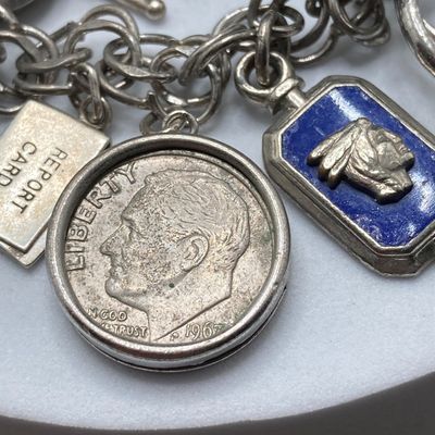 LOT 235: Vintage Elco Sterling Silver Charm Bracelet with Safety Chain and Charms - 54.3gtw