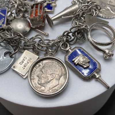 LOT 235: Vintage Elco Sterling Silver Charm Bracelet with Safety Chain and Charms - 54.3gtw